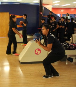 Planning out her next toss, freshman Sadi Alonzo quietly approaches the bowling lane.
