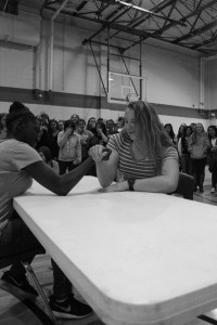 Above: Senior Kelsey Shannon defeats junior Cydni DeVillier in the arm-wrestling competition on March 8.